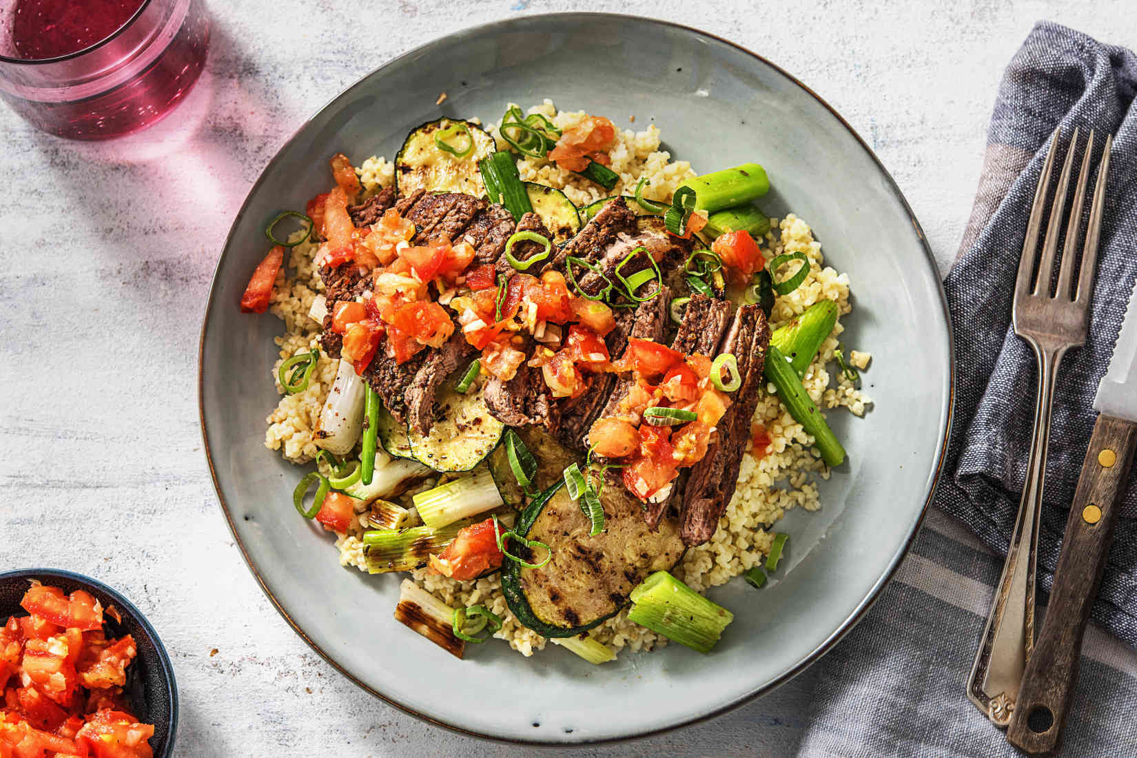 Grilled-Mediterranean-Steak-over-Bulgur-with-Zucchini-and-a-Tomato ...