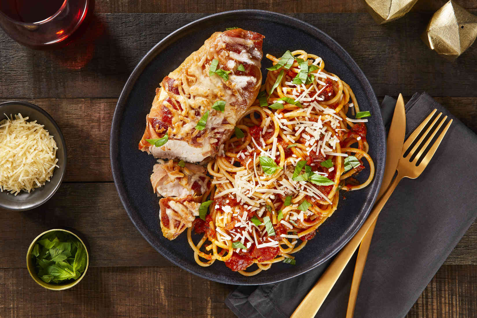 CheesyProsciuttoChickenoverSpaghettiwithTuscanSpicedMarinara