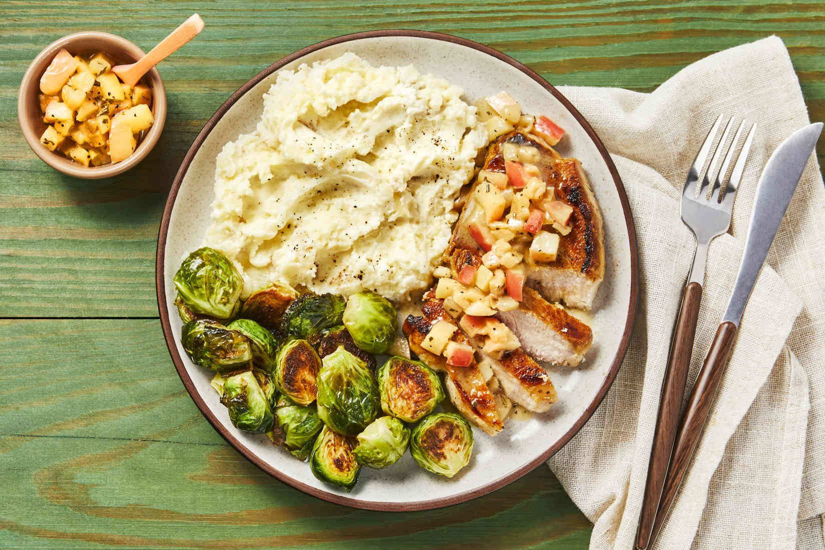 PorkChopsAppleRosemaryPanSaucewithMashedPotatoesRoastedBrusselsSprouts Feel