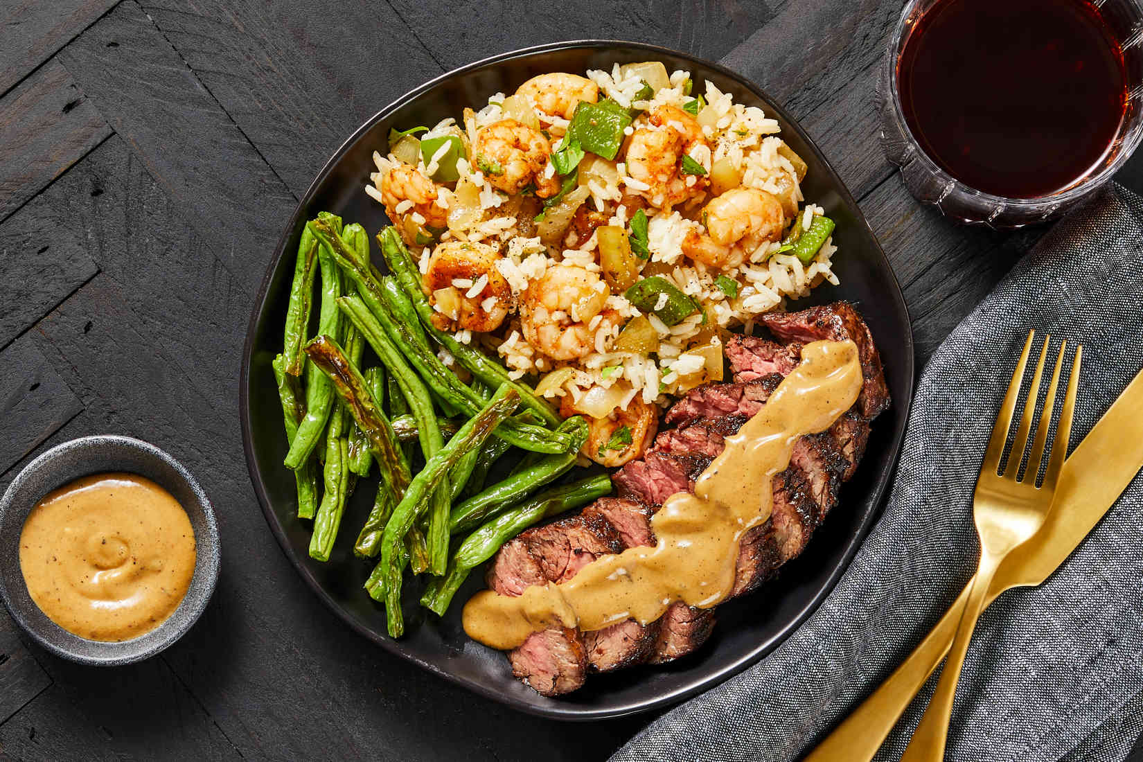 CajunSpicedSteakwithShrimpDirtyRiceplusRoastedGreenBeans
